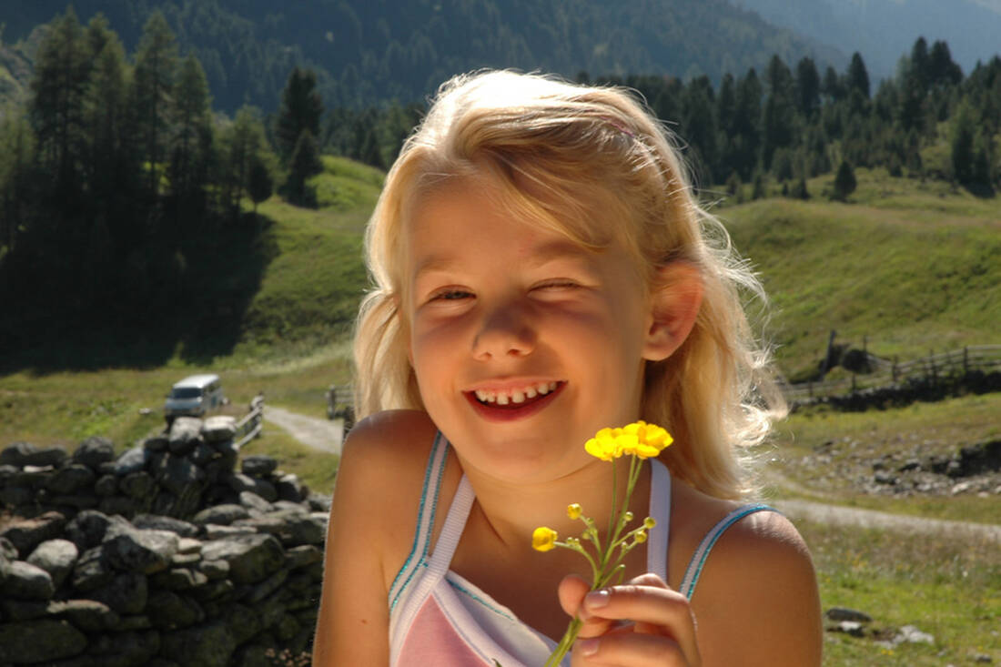 Child with flower