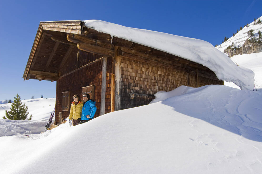 Snow-covered cabin in the Achensee region