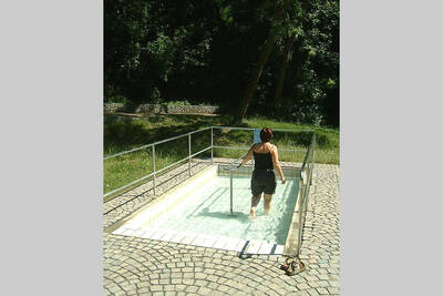 In the Kneipp pool while treading water
